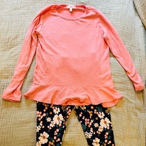 Cute set.  Pink knit top and cute patterned leggings.